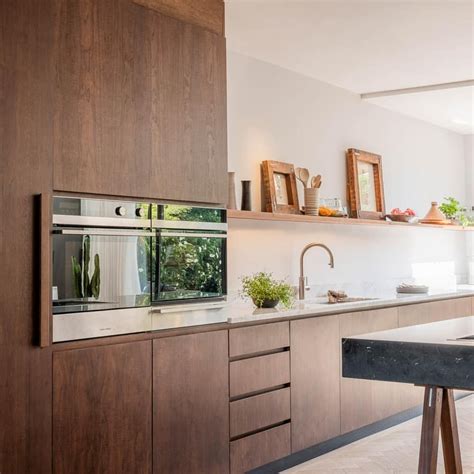 A dark and handsome modern wood kitchen. The beautiful walnut timber used in the Highgate Kitchen ...