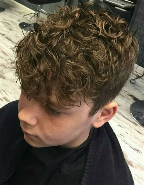 The curly hair is let to grow in length and then bleached. 10 Coolest Haircuts for Boys with Curly Hair April. 2020