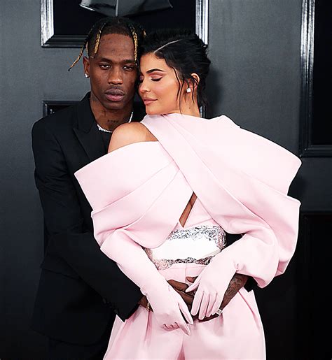 kylie jenner and travis scott hold hands with stormi in london photo hollywood life