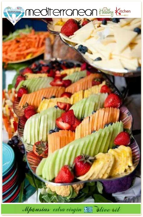 In 15 minutes, you can build this easy baby shower fruit tray featuring a fruit snowman made of fuyu persimmons, blueberries, and green grapes. bridal shower fruit tray ideas