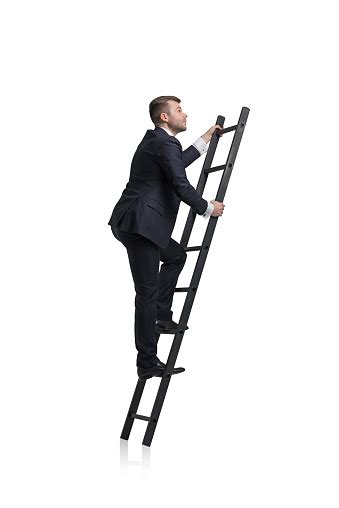 Businessman Is Climbing To The Career Ladder Stock Photo Download