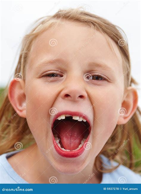 Cute Small Girl Showing Her Open Mouth Stock Photo Image Of Laughing