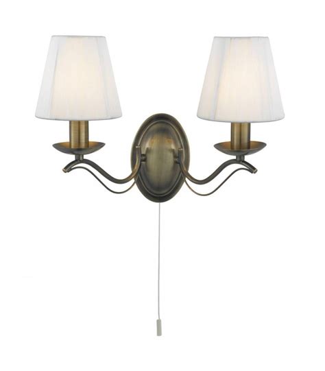 Bathe your home in beautiful light with wall lights from next. 2 Light Indoor Wall Light Antique Brass with Shades