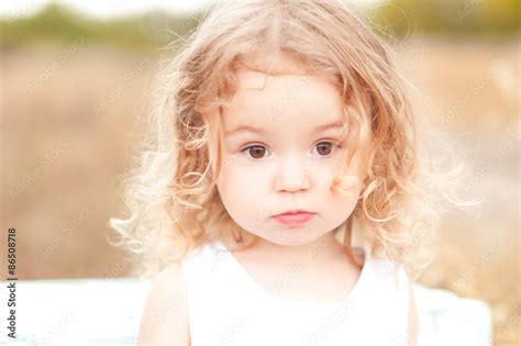 Cute Baby Girl With Blonde Curly Hair Outdoors Little Girl 2 3 Year