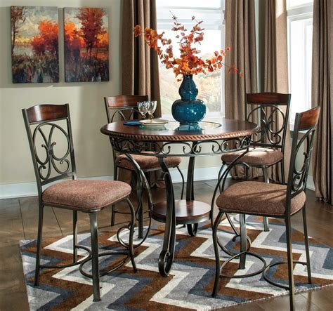 Crosspointe pub table set counter height leg table is constructed of solid hardwoods table has a self storing 18 butterfly leaf dark espresso cherry finish counter height chair. Glambrey Round Dining Room Counter Height Table Set from ...