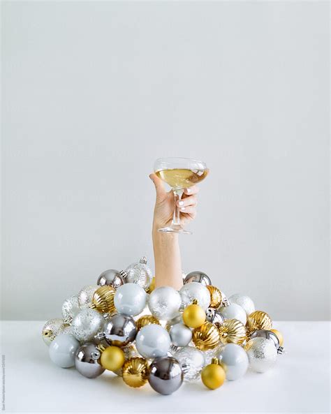 Hand Holding A Glass Of Champagne By Stocksy Contributor Duet Postscriptum Stocksy