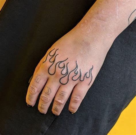 Flames Hand Tattoo