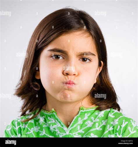 Portrait Of A Little Girl Making A Bored Expression Stock Photo Alamy