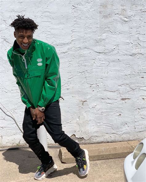 Youngboy Wearing An Off White Anorak Jacket And Versace