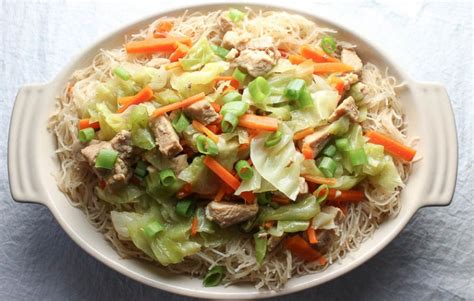 Filipino Pancit Bihon Stir Fried Rice Noodles With Pork And Vegetables