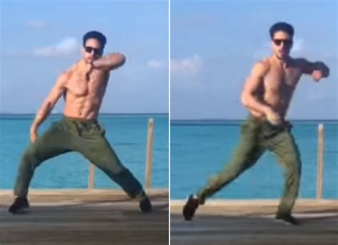 WATCH Tiger Shroff Flaunts His Ab Tastic Body While Taking It Easy