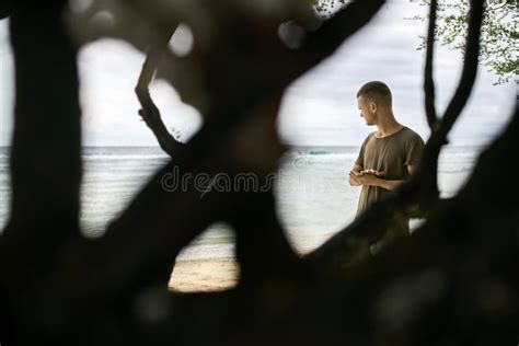 Handsome Guy Stands On Tropical Sand Beach Stock Photo Image Of