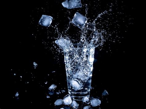 Ice Cubes Dropped In Clear Drinking Cup With Water Photo Free Water