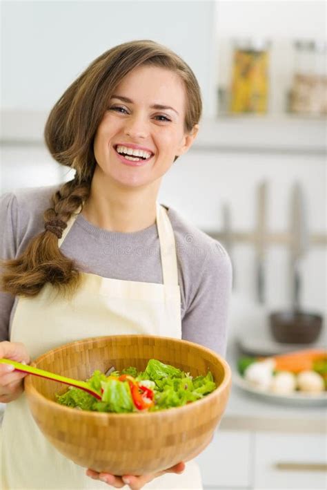 Happy Young Housewife Giving Fresh Salad Stock Photo Image Of Happy