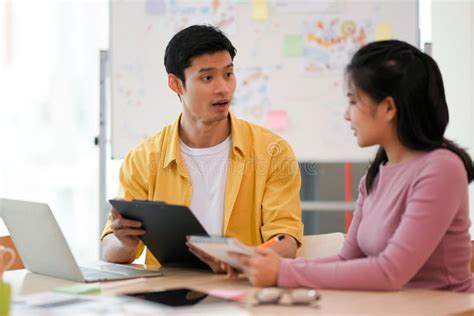 Male Officer Talking With Female Coworker In The Office Workplace Stock Image Image Of Company