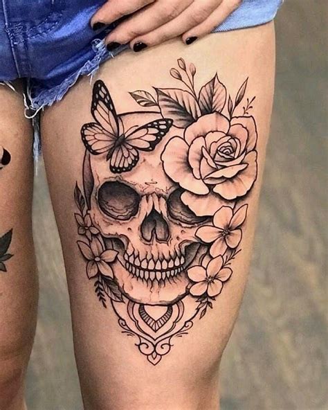 Pin By Alicia Ardieta On Body Works Feminine Skull Tattoos Skull Thigh Tattoos Thigh Tattoos