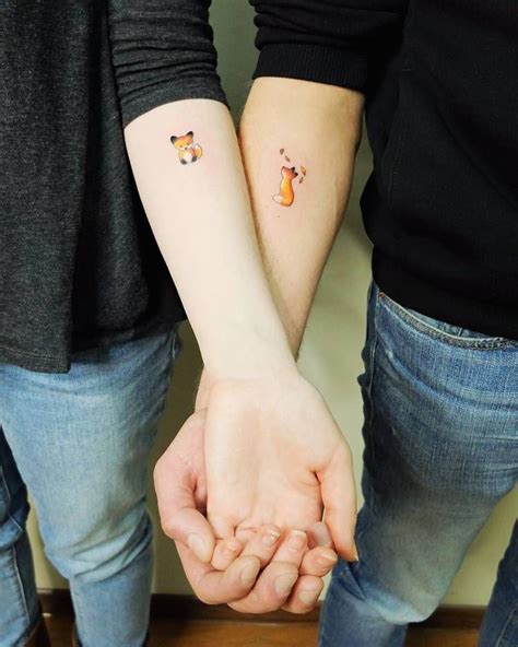 Tiny Matching Foxes On Couple By Vitaly Kazantsev Fox Tattoo Design