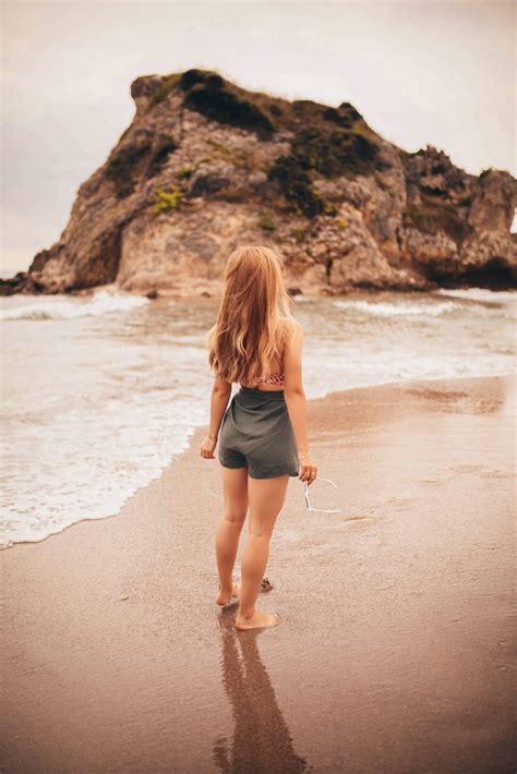 Beautiful Blonde Modeling On The Beach In A Pic Nic Setup Wearing A Bikini Bare Feet In The Sand