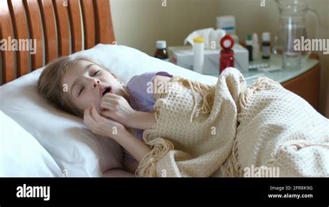 Coughing Girl Lying On A Bed Under The Blanket Portrait Sick Girl 7
