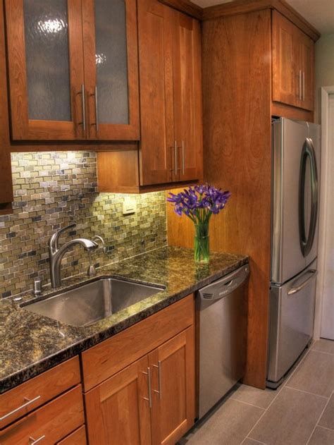 A minimum of 18 inches of splash should be operating procedure. they create a kitchen backsplash with much more depth, character, and detail than. Light Cherry Cabinets | Houzz