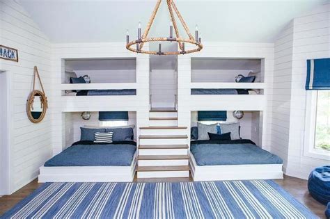White And Blue Nautical Shared Bedroom Boasting Built In Loft Bunk Beds