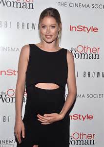 Pregnant Doutzen Kroes Cradles Her Blossoming Belly In Midriff Baring Black Gown While