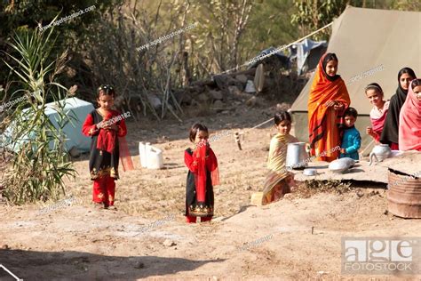 Children By A Tent Set Up After The 8 October 2005 Earthquake Arja