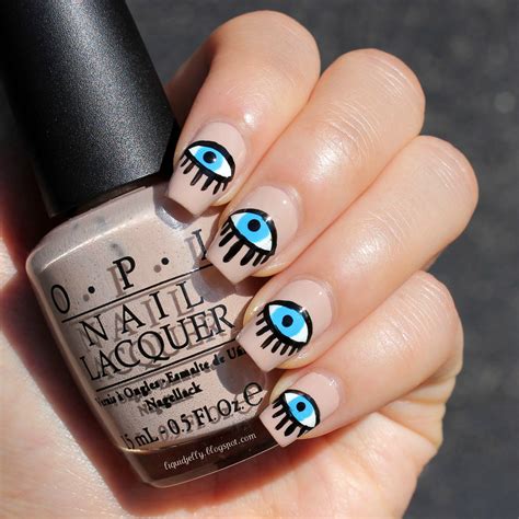 Alexa Chung S Evil Eye Nail Art How To Paint A Themed Nail Manicure