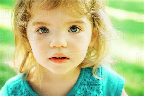 Portrait Of Serious Preschool Girl Stock Photo Dissolve