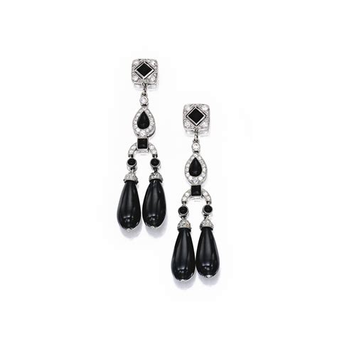 pair of platinum onyx and diamond pendant earrings cartier the girandole style earrings set