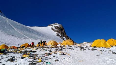 Dead bodies on the route and in tents at camp 4. Mount Everest: Melting glaciers expose dead bodies