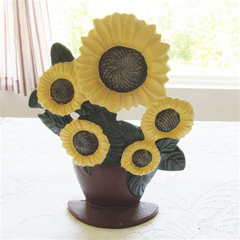 This door stop is built like a brick, made using odorless rubber with small, straight ridges for effective wedging. Vintage Cast Iron Door Stop Sunflower Door Holder ...