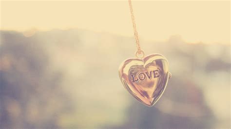 Love Word Heart Gold Chain Pendant In Blur Background Hd Heart