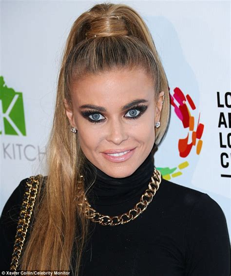 Carmen Electra 42 Bares Midriff In Cropped Top While Attending
