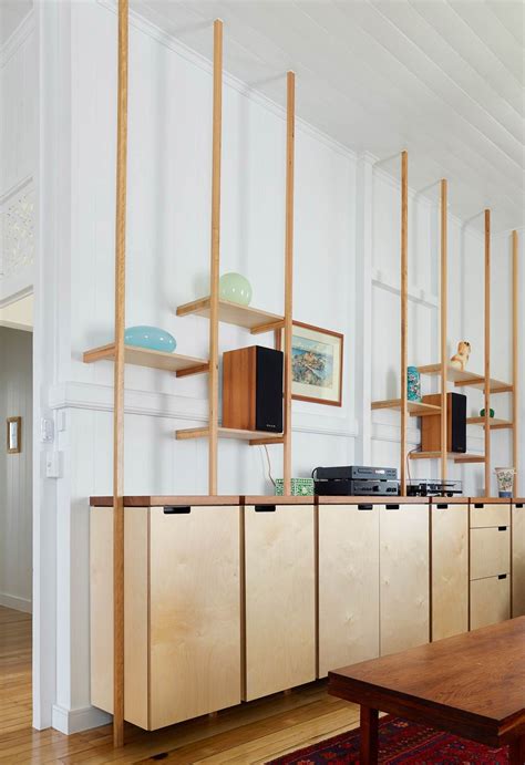 Put the chair at an angle facing the sofa. An old Queenslander on a steep slope is refreshed | Shelving design, Plywood design, Interior ...