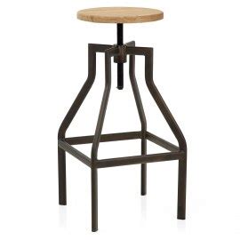 Invest in a tough glass worktop saver, doubling as a heat mat or serving board whilst providing an ideal surface on which to cut meat, vegetables and fruit. Bloc Stool Dark Wood - Atlantic Shopping