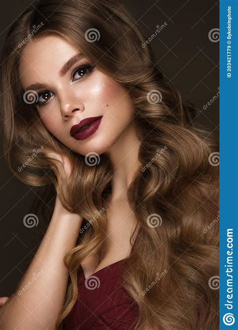 beautiful woman with classic make up fashion hair and red lips beauty face photo taken in the