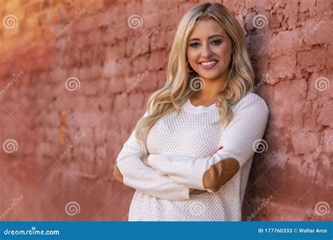 a lovely blonde model enjoys an autumn day outdoors in a small town stock image image of