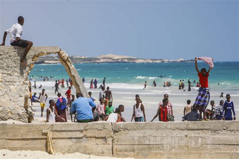 Somali Civilians Are Seen At Lido Beach A Popular Destination On A