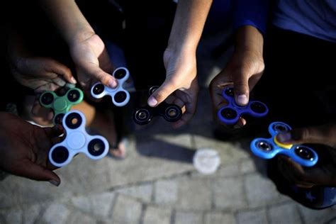 Russia Probes Fidget Spinners Over Health Fears The Straits Times
