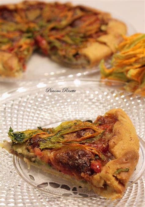 Un giro di olio e sale ed infornare a 200° per 30/35 min. Torta salata con zucchine, alici e fiori di zucca - facile ...