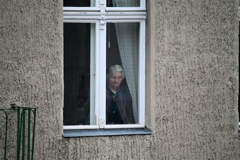 Old Sad Woman Looking Through Window Free Photo Download Freeimages