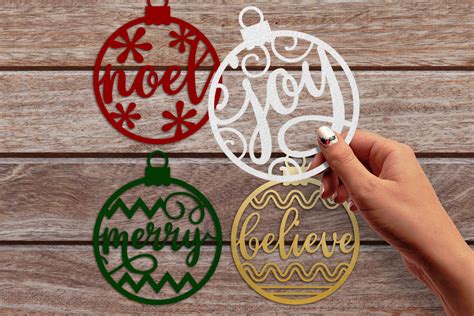 Papercut Christmas Word Ornaments Graphic By Risarocksit · Creative Fabrica