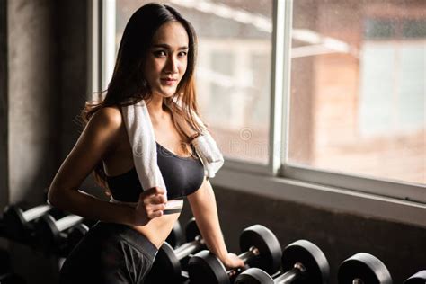 Sporty Woman With Exercise Equipment In The Gym Stock Image Image Of Beautiful Biceps 169082053