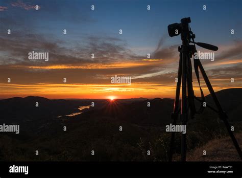 Landscape Photography Gear Including Tripod And Dslr Camera Looking