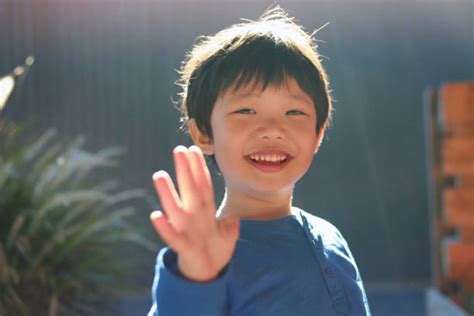 Asian Kid Waving Stock Photos Pictures And Royalty Free Images Istock