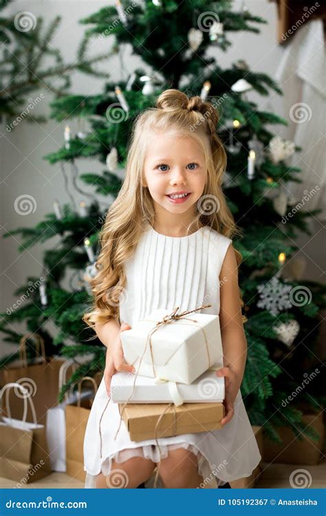 Happy Cute Little Smiling Girl With Christmas T Box Merry Christmas