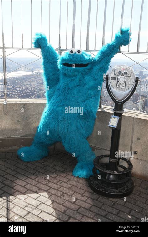 Cookie Monster Sesame Street Characters Visit The Top Of The Empire