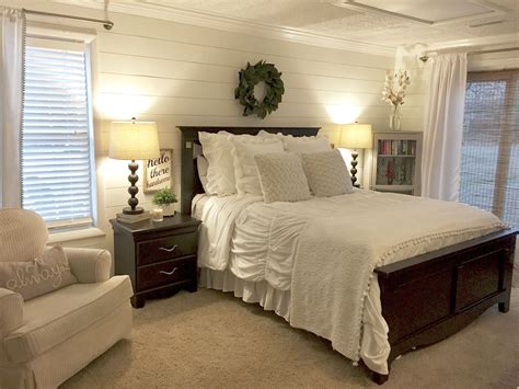 Cozy white and black fireplace and mirrors. Shiplap bedroom walls with farmhouse charm... magnolia ...