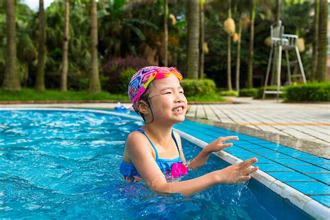 Kid Summer Fun In Swimming Pool By Stocksy Contributor Bo Bo Stocksy